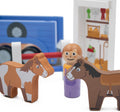 Wooden toy horses included with Jumini farm trailer playset